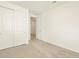 Carpeted bedroom featuring a closet with sliding doors at 4256 W Jeanette Ln, San Tan Valley, AZ 85144