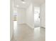 Bright hallway with tile flooring leading to other rooms at 4256 W Jeanette Ln, San Tan Valley, AZ 85144