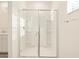 Bathroom features a new glass enclosed shower and a sleek design for a clean and modern look at 4256 W Jeanette Ln, San Tan Valley, AZ 85144