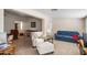 Inviting living room with multiple seating areas and a cozy atmosphere at 11038 W Windsor Dr, Sun City, AZ 85351
