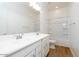 Well-lit bathroom featuring double sinks and a shower-tub combo at 4780 W Flat Iron Ct, Queen Creek, AZ 85144