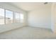 Spacious bedroom featuring large windows, plush carpeting and neutral color scheme at 4780 W Flat Iron Ct, Queen Creek, AZ 85144