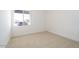 Bedroom featuring a window with outside view and carpeted floors at 4780 W Flat Iron Ct, Queen Creek, AZ 85144