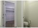Half bath near a large walk in closet with shelving for maximum storage at 846 N Pueblo Dr # 110, Casa Grande, AZ 85122