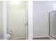 Bright bathroom featuring a toilet in a separate room, alongside a shower with glass doors at 846 N Pueblo Dr # 110, Casa Grande, AZ 85122