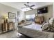 Comfortable bedroom with a queen-size bed, ceiling fan, and ample storage at 846 N Pueblo Dr # 110, Casa Grande, AZ 85122