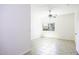 A bedroom with tile floors, a window, and a ceiling fan at 846 N Pueblo Dr # 110, Casa Grande, AZ 85122
