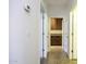 Hallway view leading to cabinets with granite countertop, doors, and light switches at 846 N Pueblo Dr # 110, Casa Grande, AZ 85122