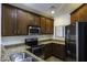Spacious kitchen features stainless steel appliances and ample cabinet space at 846 N Pueblo Dr # 110, Casa Grande, AZ 85122