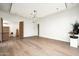 Open living space with hardwood floors, neutral walls, and modern decor at 8386 E Leaning Rock Rd, Scottsdale, AZ 85266