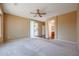 Bedroom with sliding door to patio access at 19403 N Ponderosa Ct, Surprise, AZ 85387