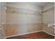 Large walk-in closet with wire shelving at 19403 N Ponderosa Ct, Surprise, AZ 85387