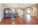 Formal dining room with hardwood floors and decorative furniture at 19403 N Ponderosa Ct, Surprise, AZ 85387