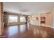 Spacious living area with hardwood floors and views to backyard at 19403 N Ponderosa Ct, Surprise, AZ 85387