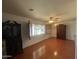 Spacious dining area with hardwood floors, natural light, and built-in cabinets at 3614 W Krall St, Phoenix, AZ 85019