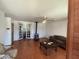 Comfortable living room with a wood-burning stove, ceiling fan, and unique tiled flooring at 3614 W Krall St, Phoenix, AZ 85019