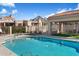 Inviting community pool with a covered patio and surrounding landscaping at 6334 N 19Th St, Phoenix, AZ 85016
