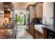 Kitchen boasts granite countertops, custom cabinetry, and a farmhouse sink at 6334 N 19Th St, Phoenix, AZ 85016