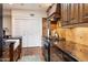 Kitchen features granite countertops, custom cabinetry, and a gas range at 6334 N 19Th St, Phoenix, AZ 85016