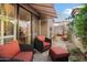 Relaxing patio with wicker furniture, creating an inviting space at 6334 N 19Th St, Phoenix, AZ 85016