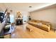 Bright living room with fireplace, hardwood floors, and large windows at 1601 N Saba St # 321, Chandler, AZ 85225