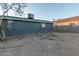 Backyard area with door to the house and air conditioning unit at 1613 S 5Th St, Phoenix, AZ 85004