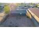 An aerial view of the home's fenced backyard, showing it is ready for landscaping and a garden at 1613 S 5Th St, Phoenix, AZ 85004