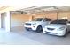 Spacious two-car garage with ample space for parking and storage at 8053 E Natal Ave, Mesa, AZ 85209