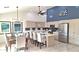 Modern kitchen with stainless steel appliances and an island at 8053 E Natal Ave, Mesa, AZ 85209