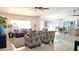 Open living room with tile floors and lots of natural light at 8053 E Natal Ave, Mesa, AZ 85209