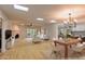 Bright living room with fireplace, hardwood floors, and patio access at 8230 E Via De La Escuela --, Scottsdale, AZ 85258