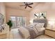 Spacious main bedroom with high ceilings and private access to the outdoors. Virtually staged at 8230 E Via De La Escuela --, Scottsdale, AZ 85258