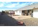 Backyard patio, gravel landscaping, and bird bath at 8203 E Nopal Ave, Mesa, AZ 85209