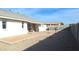 Backyard with gravel landscaping and raised garden bed at 8203 E Nopal Ave, Mesa, AZ 85209