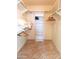 Spacious walk-in closet with shelving and hanging rods at 8203 E Nopal Ave, Mesa, AZ 85209