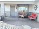 Inviting front porch with seating and decorative elements at 8203 E Nopal Ave, Mesa, AZ 85209