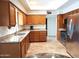 Granite countertops and stainless steel appliances in kitchen at 8203 E Nopal Ave, Mesa, AZ 85209
