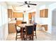 Kitchen boasts granite countertops and wood cabinetry at 8203 E Nopal Ave, Mesa, AZ 85209