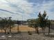 Dog park providing a secure area with wire fence and landscape, perfect for pets to roam at 1471 S 239Th Dr, Buckeye, AZ 85326