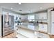 Updated kitchen, featuring stainless steel appliances and an island at 775 E Leslie Ave, San Tan Valley, AZ 85140