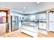 Modern kitchen with white shaker cabinets and granite countertops at 775 E Leslie Ave, San Tan Valley, AZ 85140