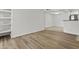 Bright living room featuring vinyl floors, and built-in shelving at 3845 E Greenway Rd # 131, Phoenix, AZ 85032
