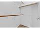 Walk-in closet features built-in shelving and wood-look floors at 3845 E Greenway Rd # 131, Phoenix, AZ 85032