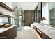 Luxurious bathroom with a freestanding tub, walk-in shower, and dual vanity sinks at 6623 N Hillside Dr, Paradise Valley, AZ 85253