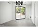 Bright bedroom space featuring large window offering a view of the landscaped backyard at 6623 N Hillside Dr, Paradise Valley, AZ 85253