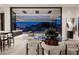 Open floor plan with dining area and outdoor living, seamlessly merging interior space with the outdoors at 6623 N Hillside Dr, Paradise Valley, AZ 85253