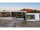 Stylish modern home with panoramic views, featuring expansive windows and clean lines at 6623 N Hillside Dr, Paradise Valley, AZ 85253
