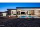 Stunning modern home featuring a sleek pool, fire pit, and seamless indoor-outdoor living at 6623 N Hillside Dr, Paradise Valley, AZ 85253