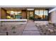 Modern home with inviting front entrance with stairway and desert landscaping at 6623 N Hillside Dr, Paradise Valley, AZ 85253