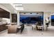 Spacious kitchen with an island and seating that seamlessly connects to dining and living spaces, enhancing entertaining at 6623 N Hillside Dr, Paradise Valley, AZ 85253